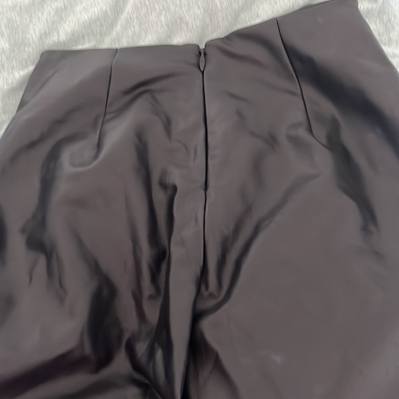 Black faux leather high waisted pants. Never worn. Size medium. - Picture 2 of 3